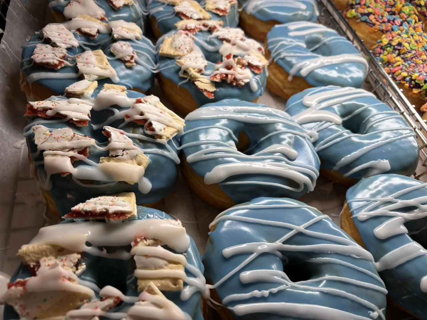 Blue frosted specialty donuts