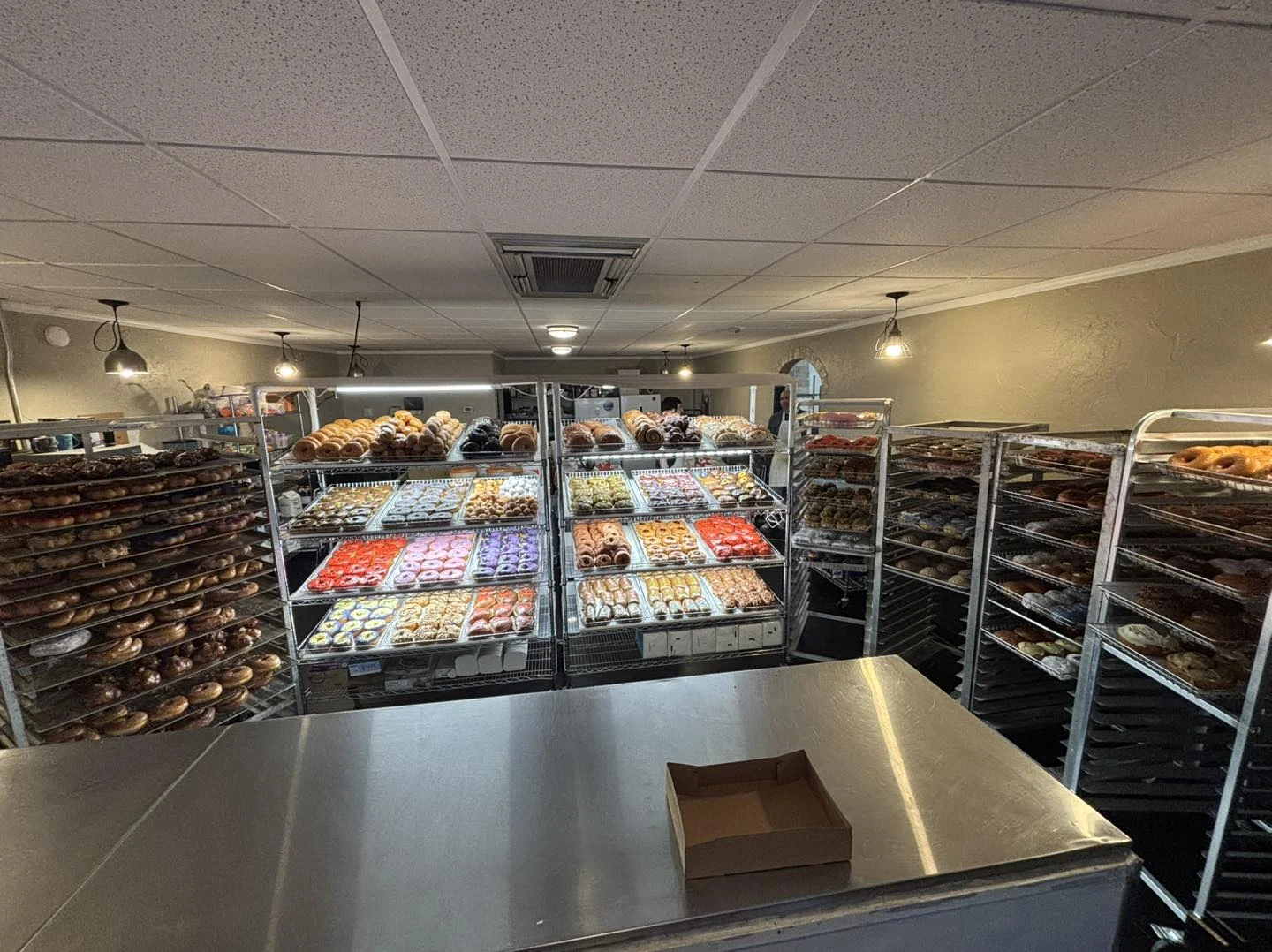 Wide interior view of Jason’s Donuts display area
